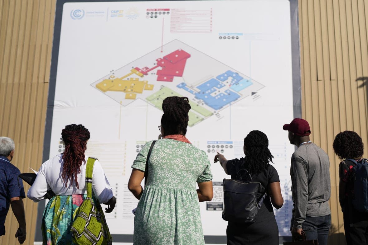 People look at a map