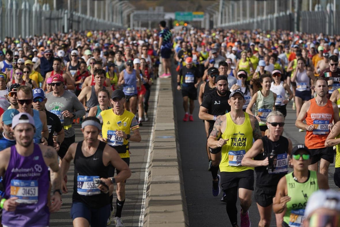 Runners cross the Verrazzano-Narrows Bridge at the start of the New York City Marathon