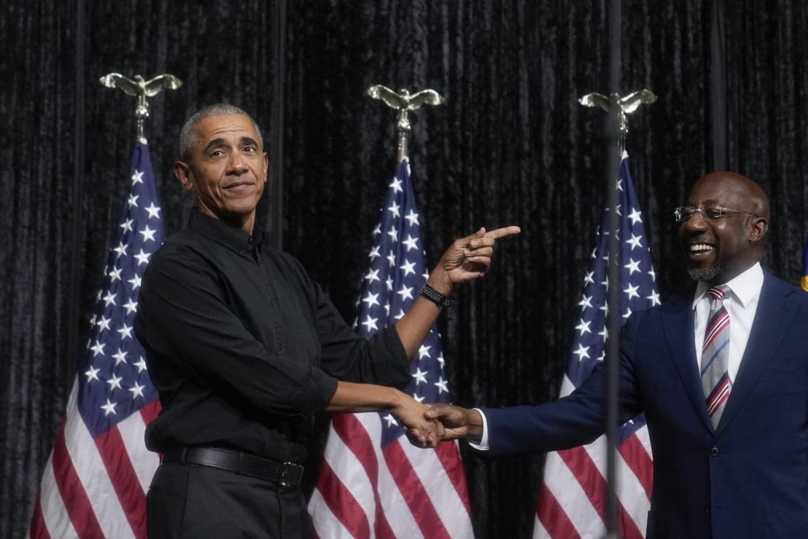 Former President Barack Obama and Democratic Senator Raphael Warnock of Georgia