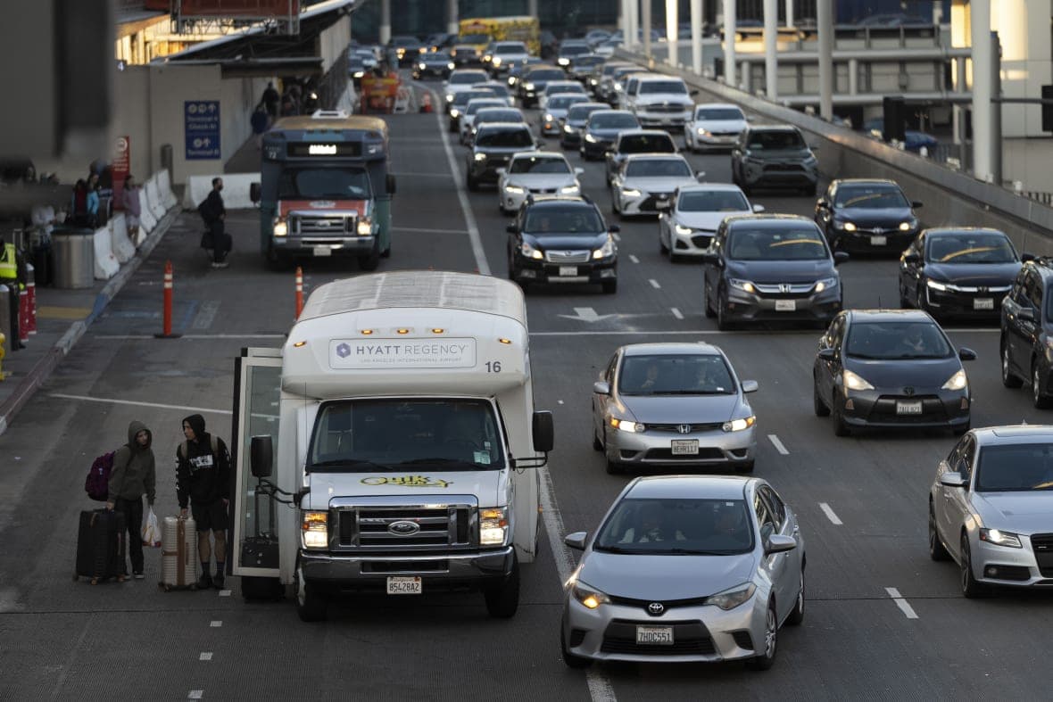 Travelers are dropped off at the Los Angeles International Airport