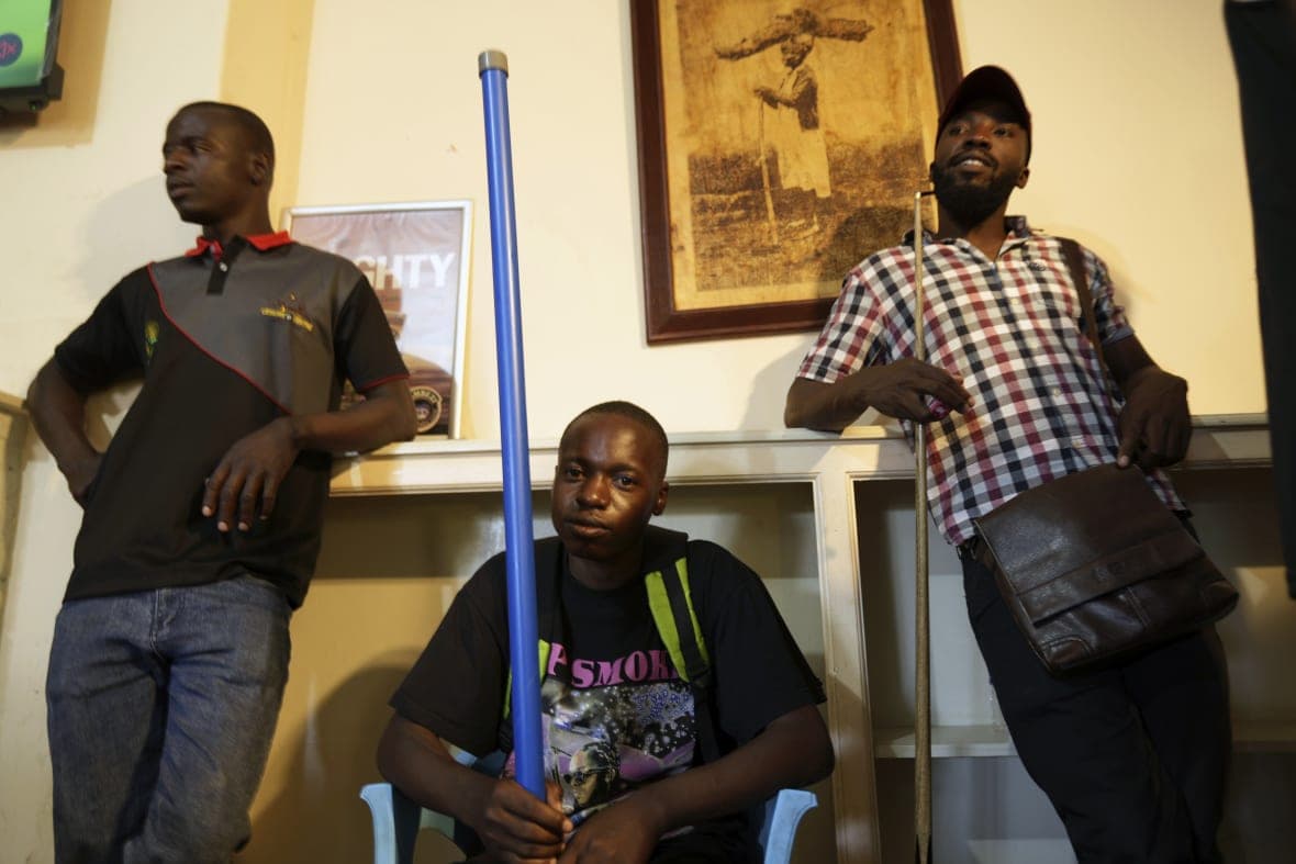 Levite Chisakarire waits for his turn to play pool