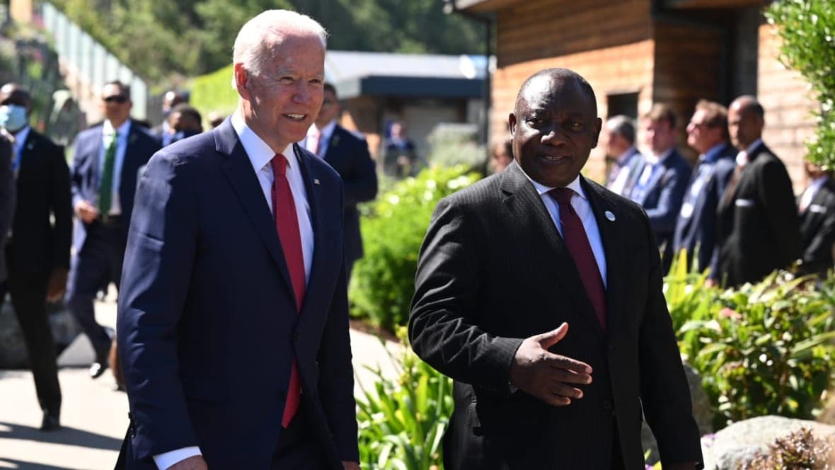 President Joe Biden talks with South Africa’s President Cyril Ramaphosa