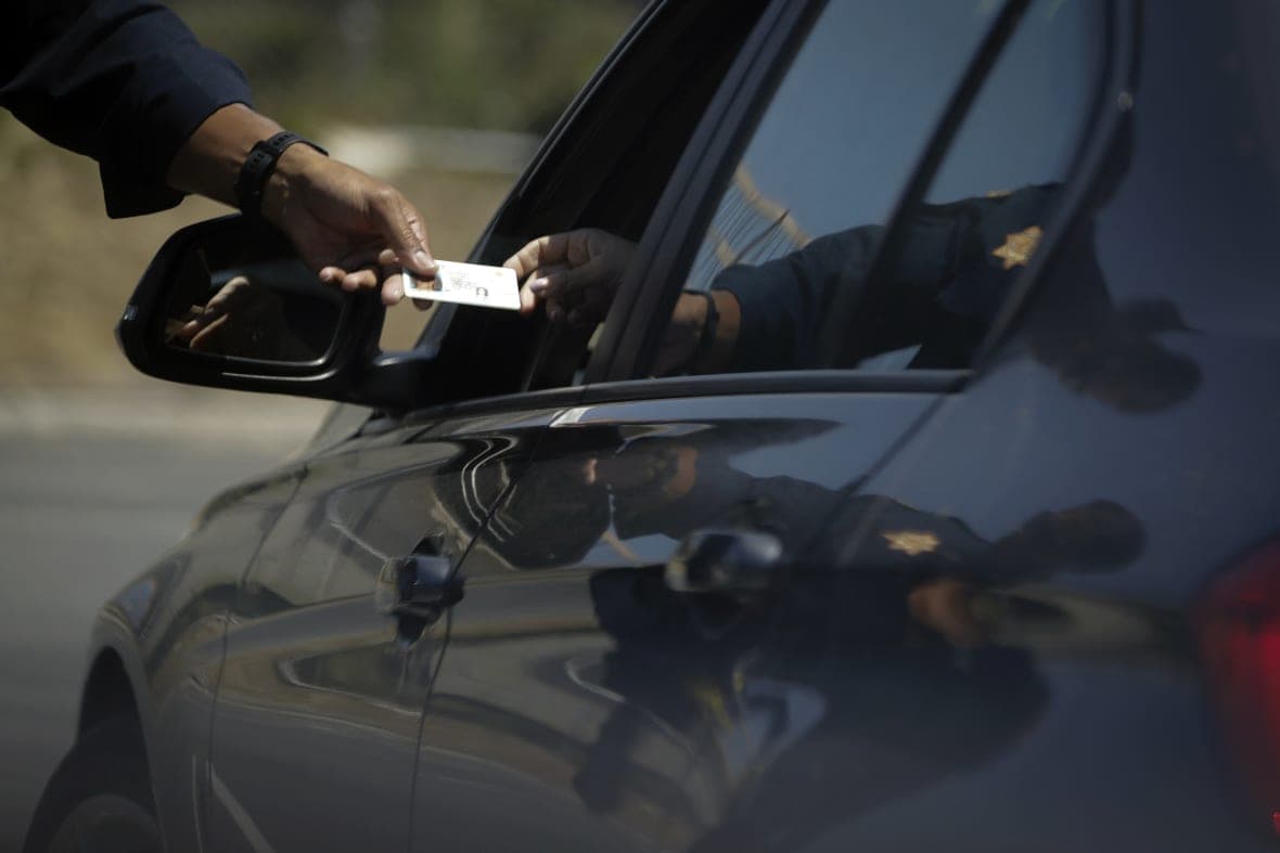 A California Highway Patrol officer stops a motorist