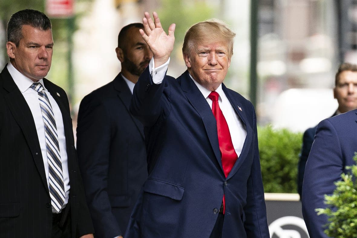 Former President Donald Trump waves