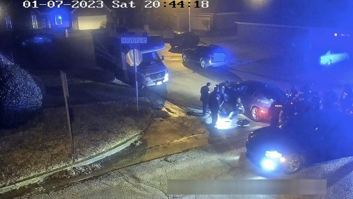 Tyre Nichols seated leaning against a car