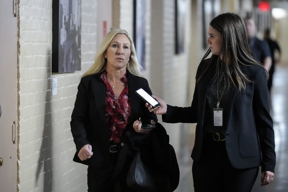 Rep. Marjorie Taylor Greene (R-GA) talks to a reporter