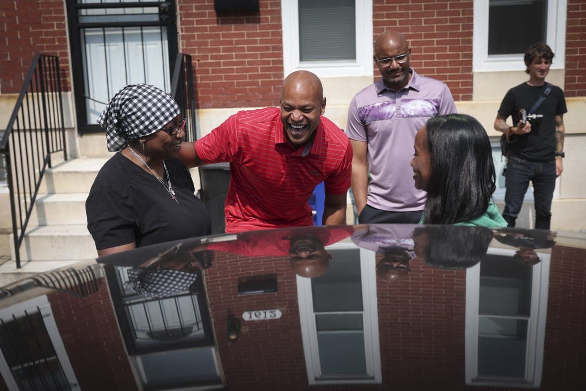 Maryland Democratic gubernatorial candidate Wes Moore talks with city residents
