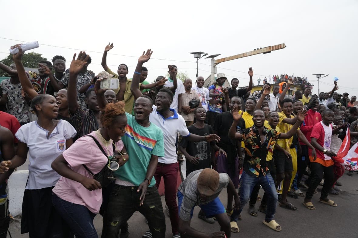 People cheer for Pope Francis