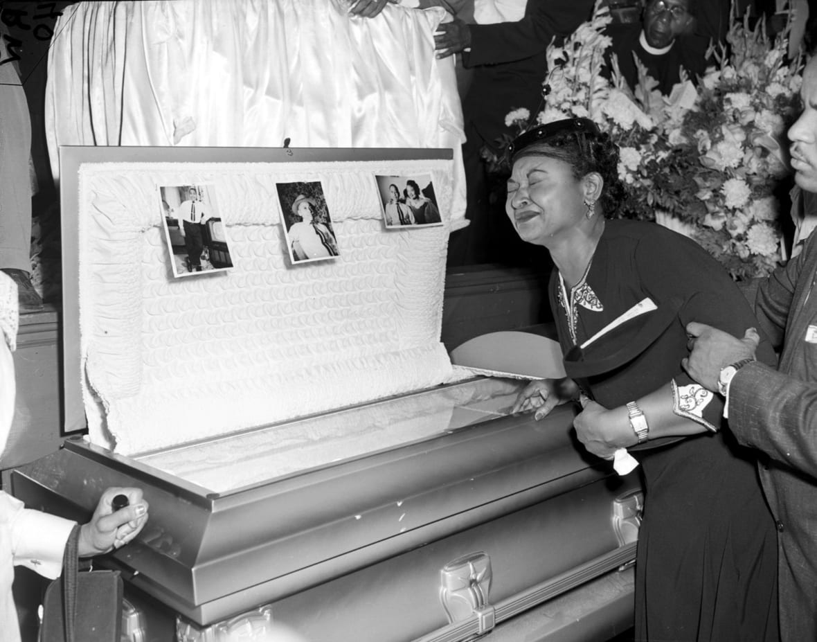 Emmett Till's mother Mamie Till-Mobley weeps at her son’s funeral