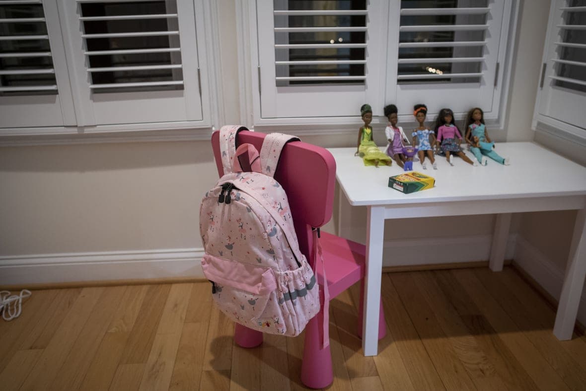 Dolls and a backpack sit in the bedroom set up for Gina, Haitian girl adopted by Bryan and Julie Hanlon