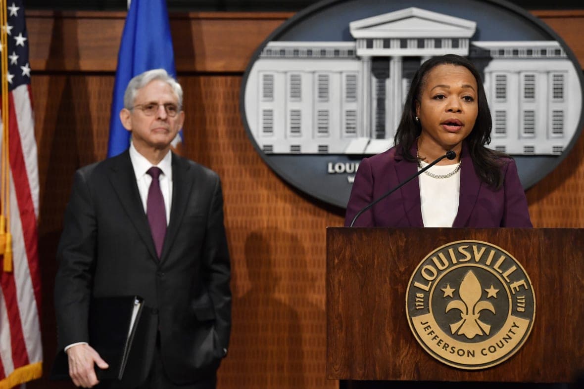 Assistant Attorney General Kristen Clarke, right