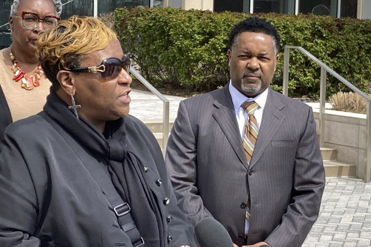 Timothy McCree Johnson’s mother Melissa Johnson and attorney Carl Crews