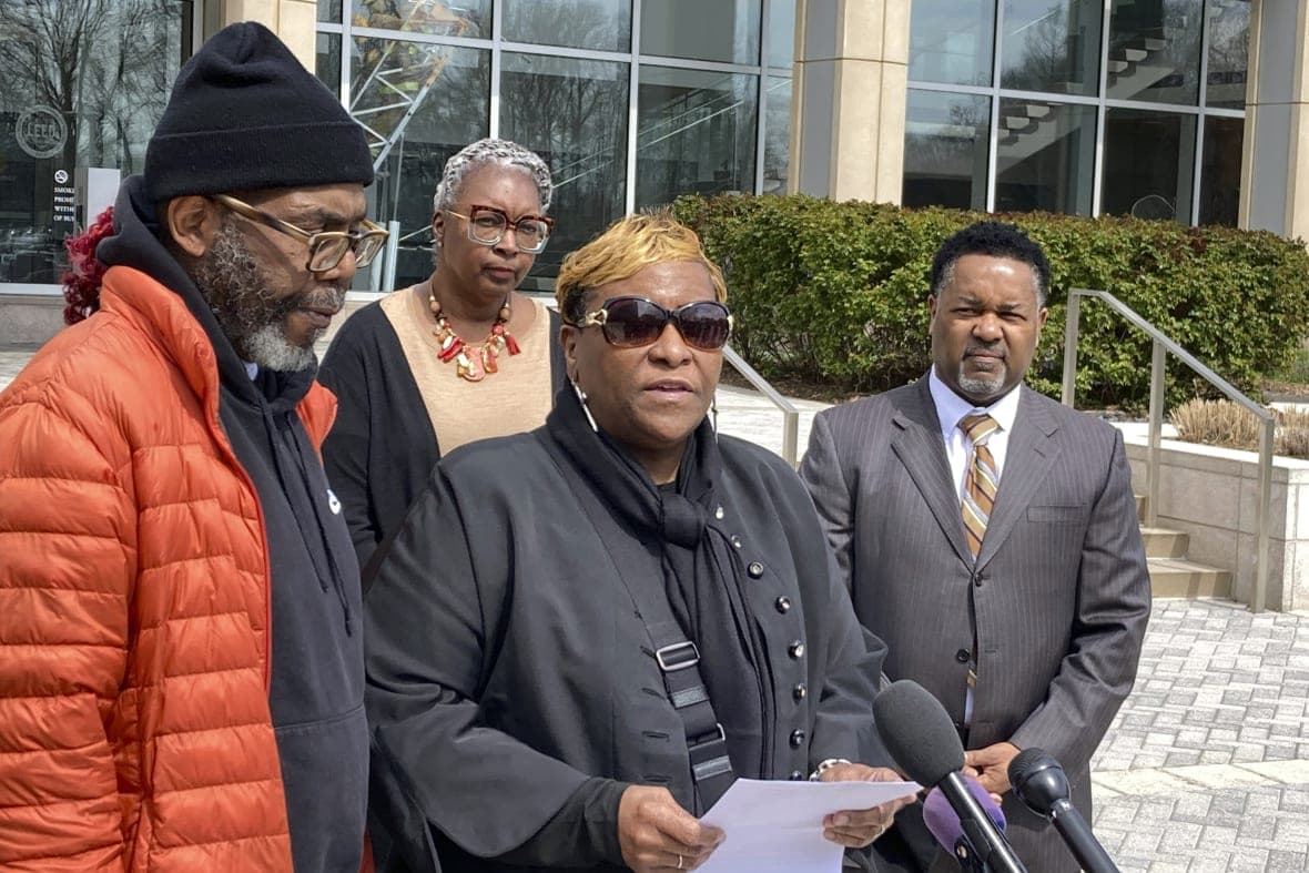 Timothy McCree Johnson’s parents Timothy Walker and Melissa Johnson address reporters with attorney Carl Crews