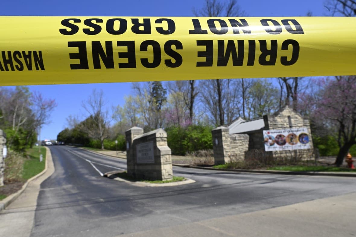 Police crime scene tape is seen at the entrance to Covenant School in Nashville, Tennessee