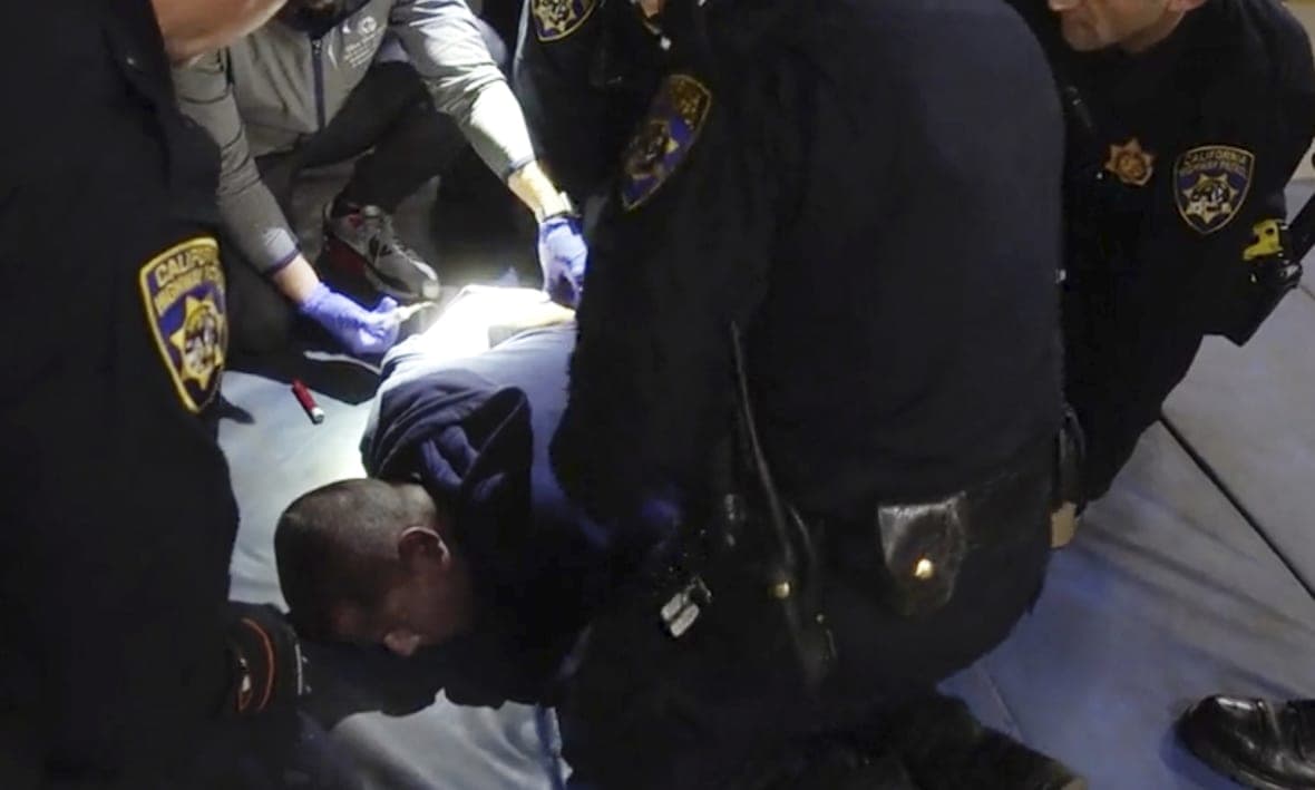 Edward Bronstein is taken into custody by CHP officers