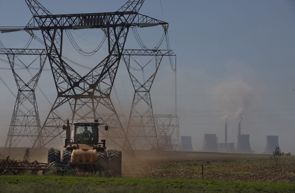 Electrical pylons leading from a coal-powered electricity generating plant east of Johannesburg
