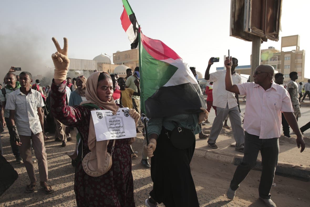 Sudanese protesters take part in a rally