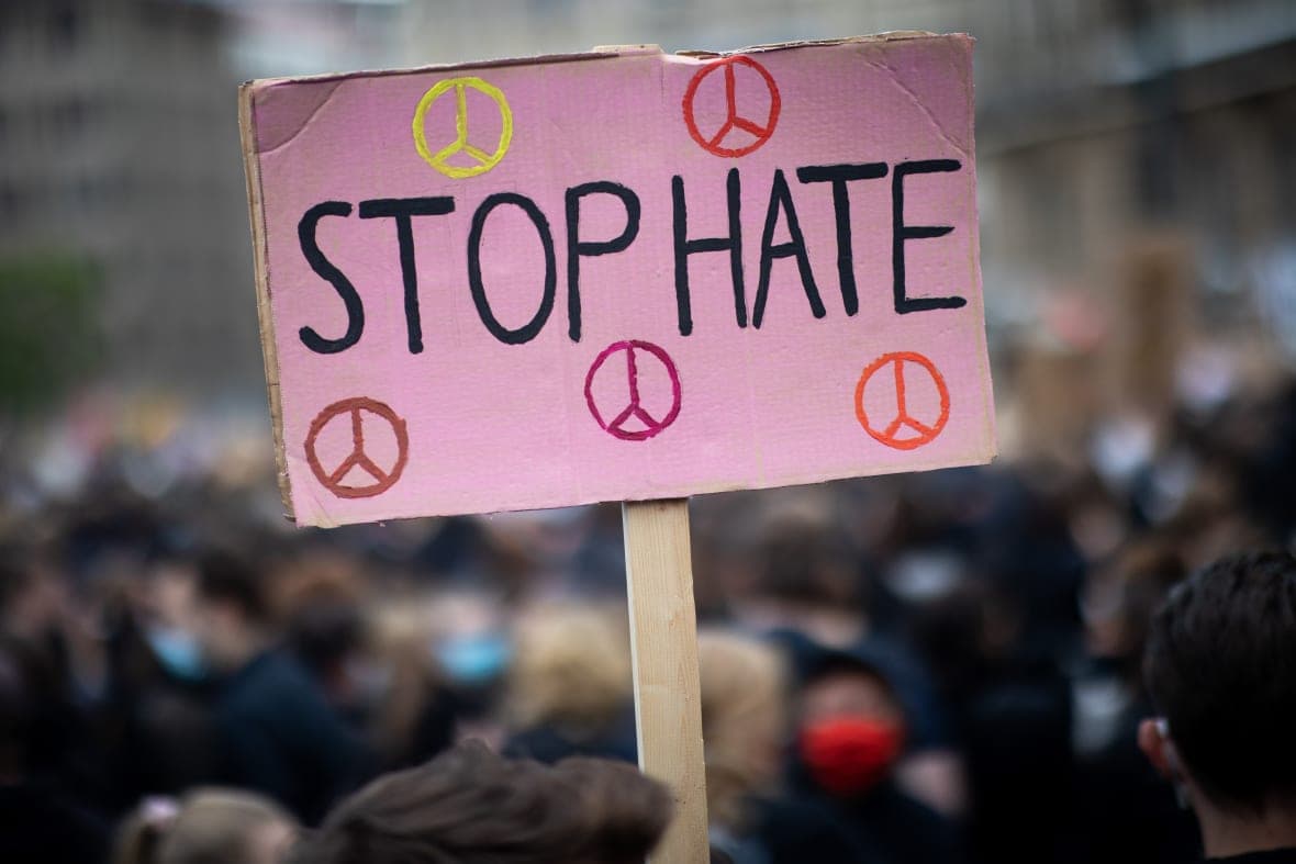A sign saying "Stop Hate"