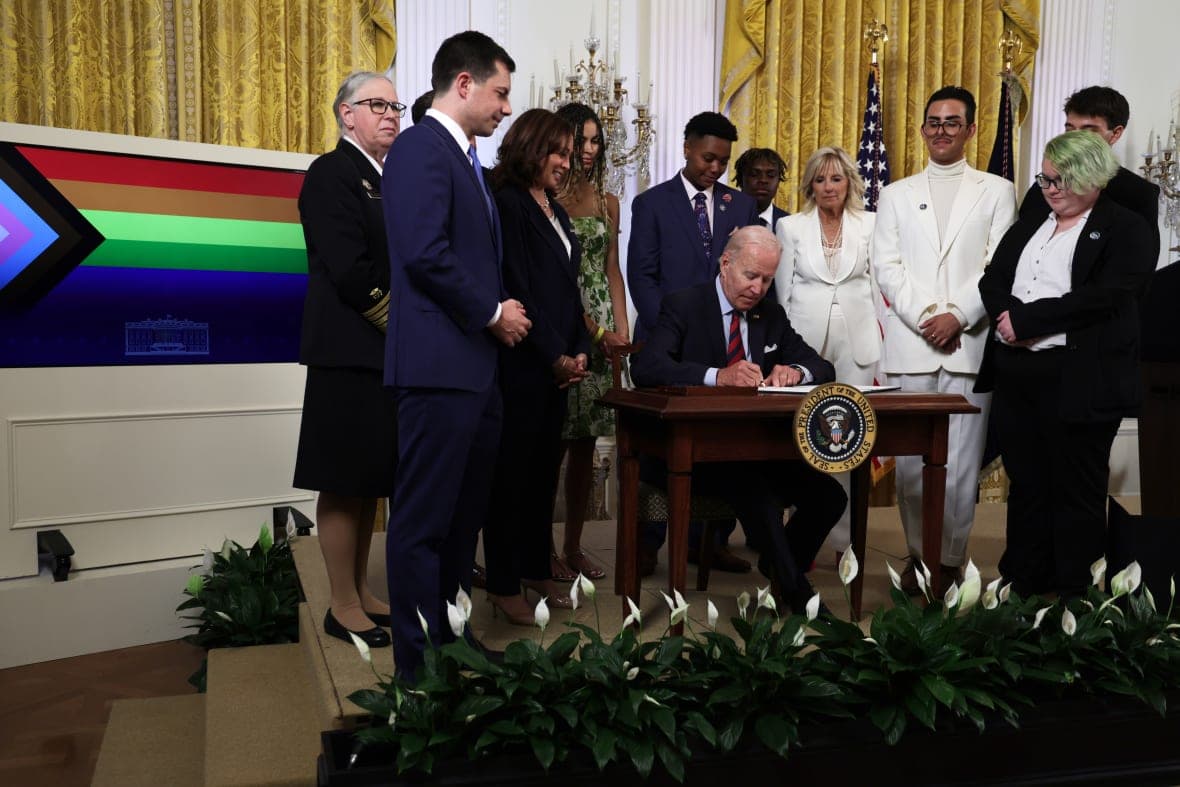 President Joe Biden, Transportation Secretary Pete Buttigieg, VP Kamala Harris, first lady Jill Biden and Javier Gomez