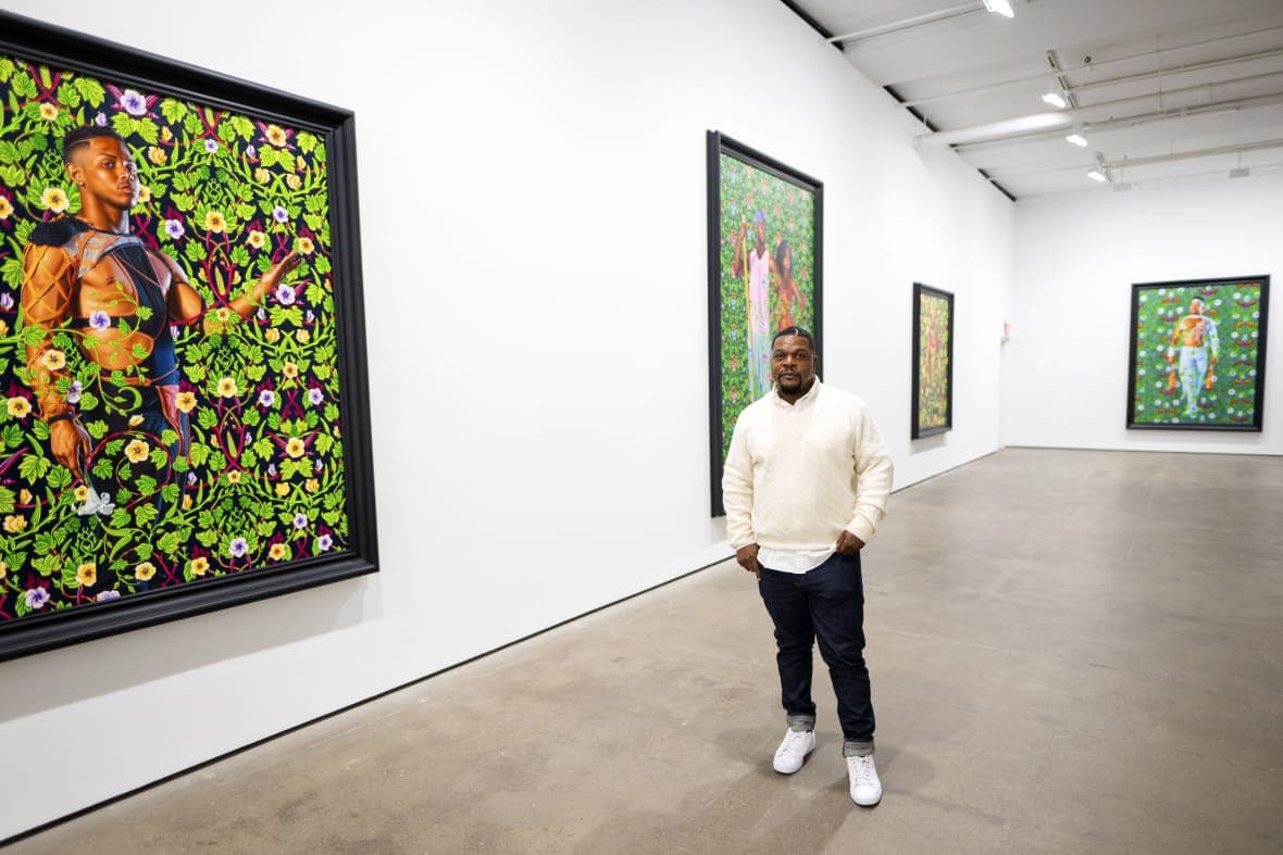 Artist Kehinde Wiley with some of his works at Sean Kelly Gallery
