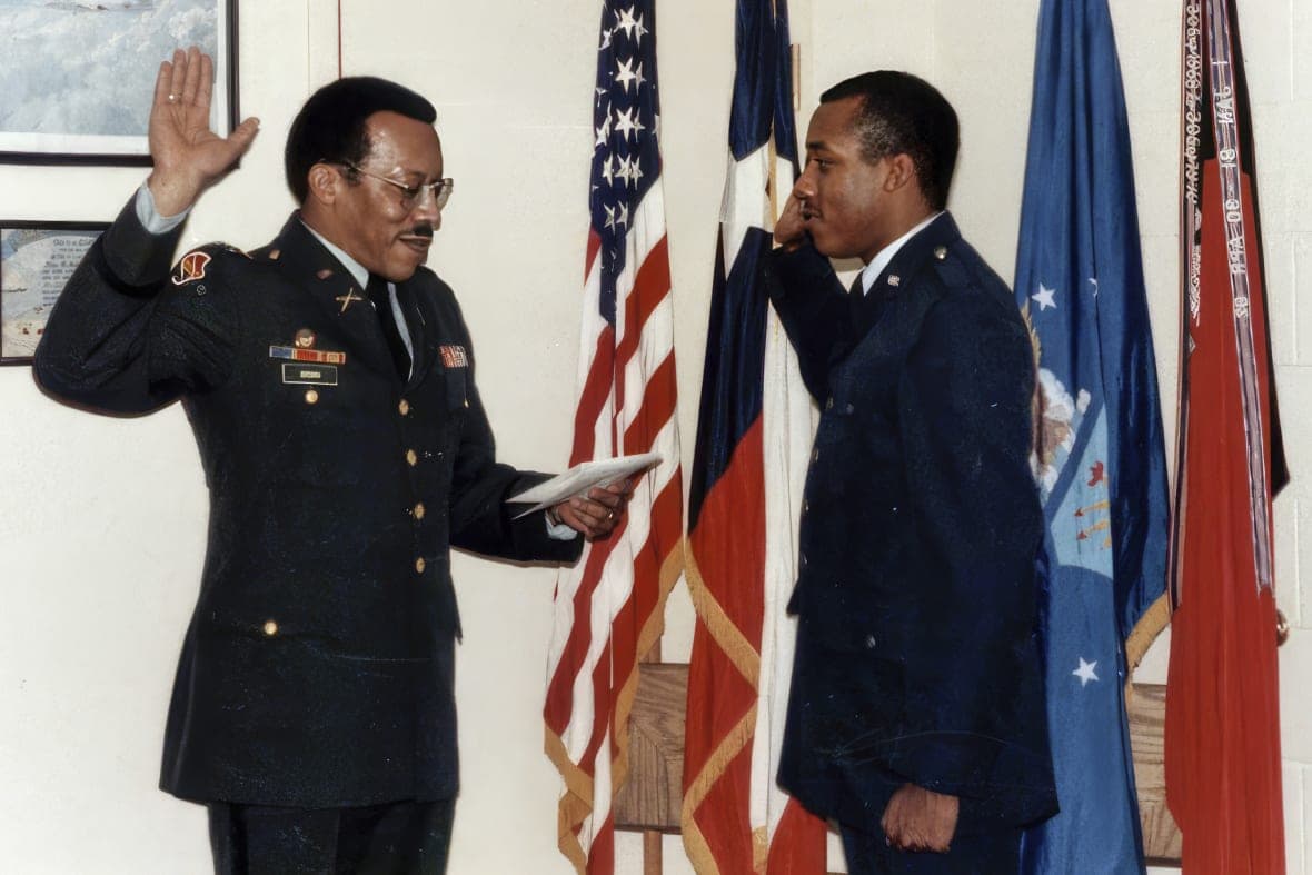Retired Army Col. Charles Q. Brown Sr. administers the oath of office to Air Force Chief of Staff Gen. CQ Brown Jr.