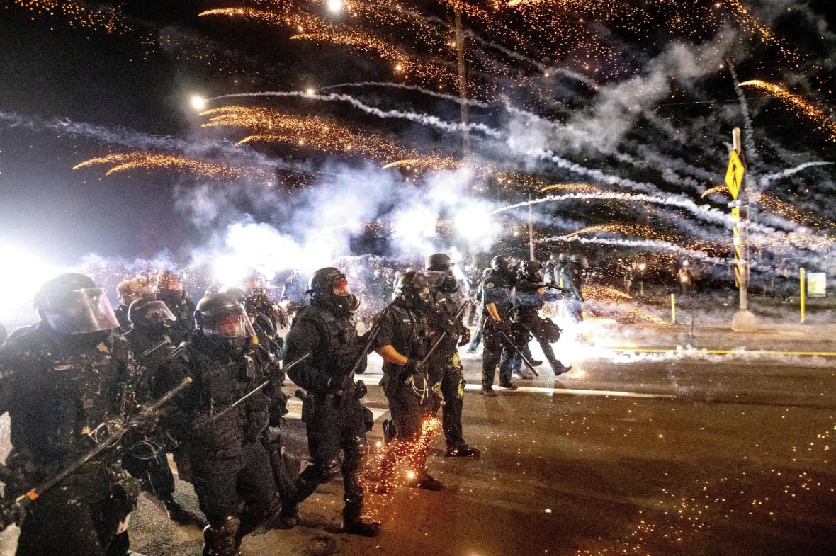 Police use chemical irritants and crowd-control munitions to disperse protesters