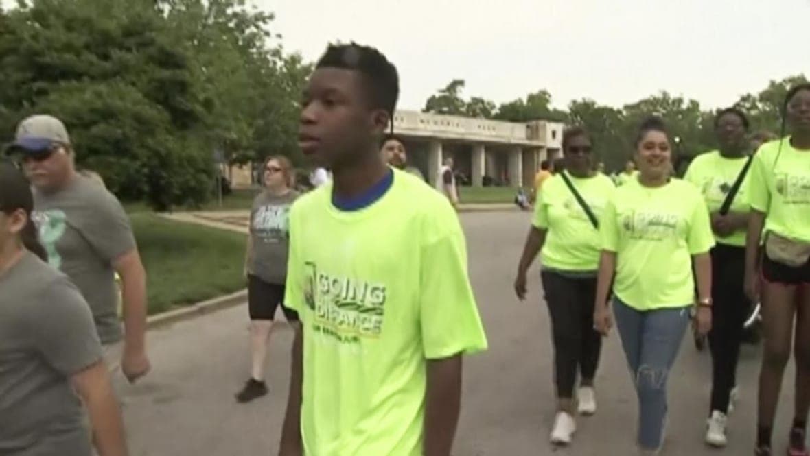 Ralph Yarl participates in a walk 