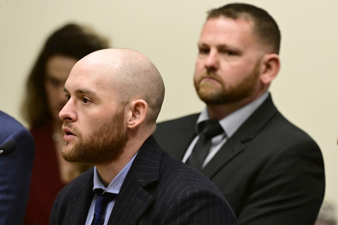 Former officer Jason Rosenblatt and Aurora Police Officer Randy Roedema at a legal hearing