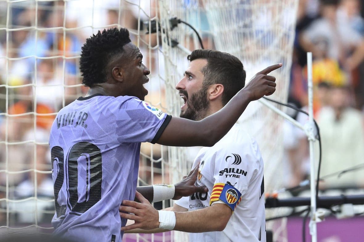 Brazilian footballer Vinicius Junior of Real Madrid and player Jose Luis Gaya of Valencia