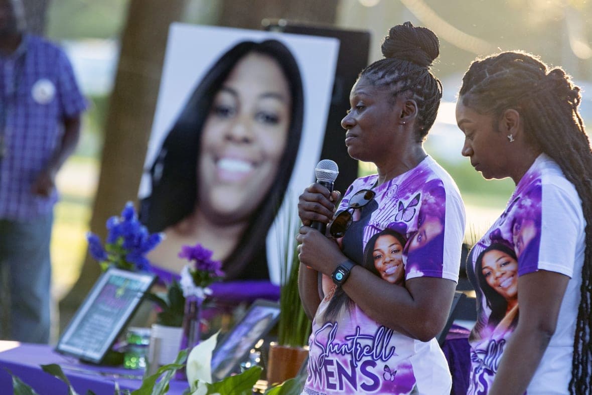 Pamela Dias, second from right, remembers her daughter, Ajike Owens