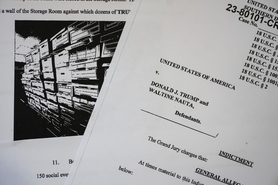 Pages from the unsealed federal indictment of former President Donald Trump
