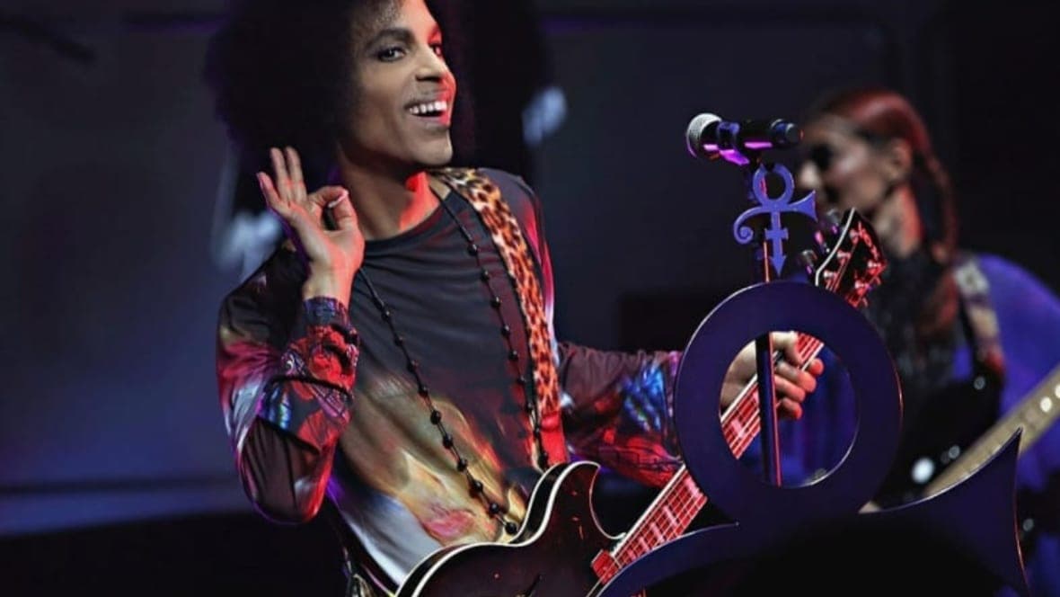 Singer Prince performs onstage with 3rdeyegirl