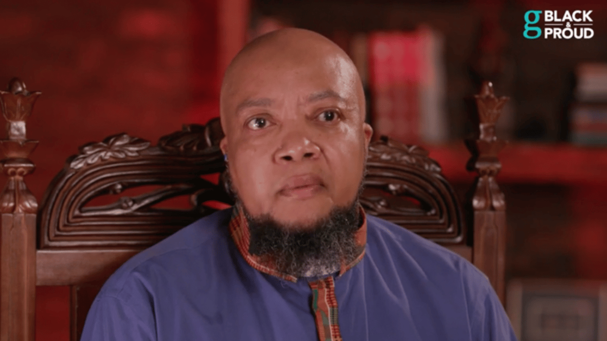 LGBTQ+ activist Yunus Coldman in a purple shirt