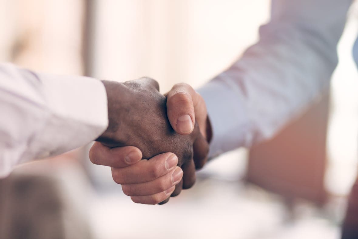 handshake between two males