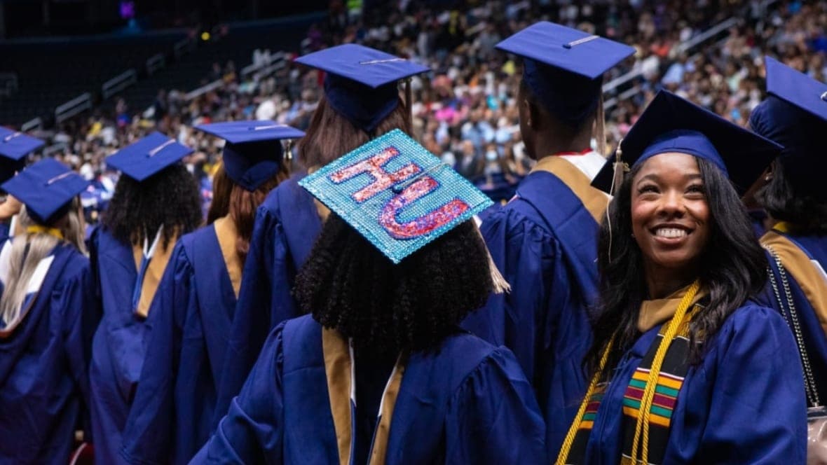 Howard University graduates in their caps and gowns