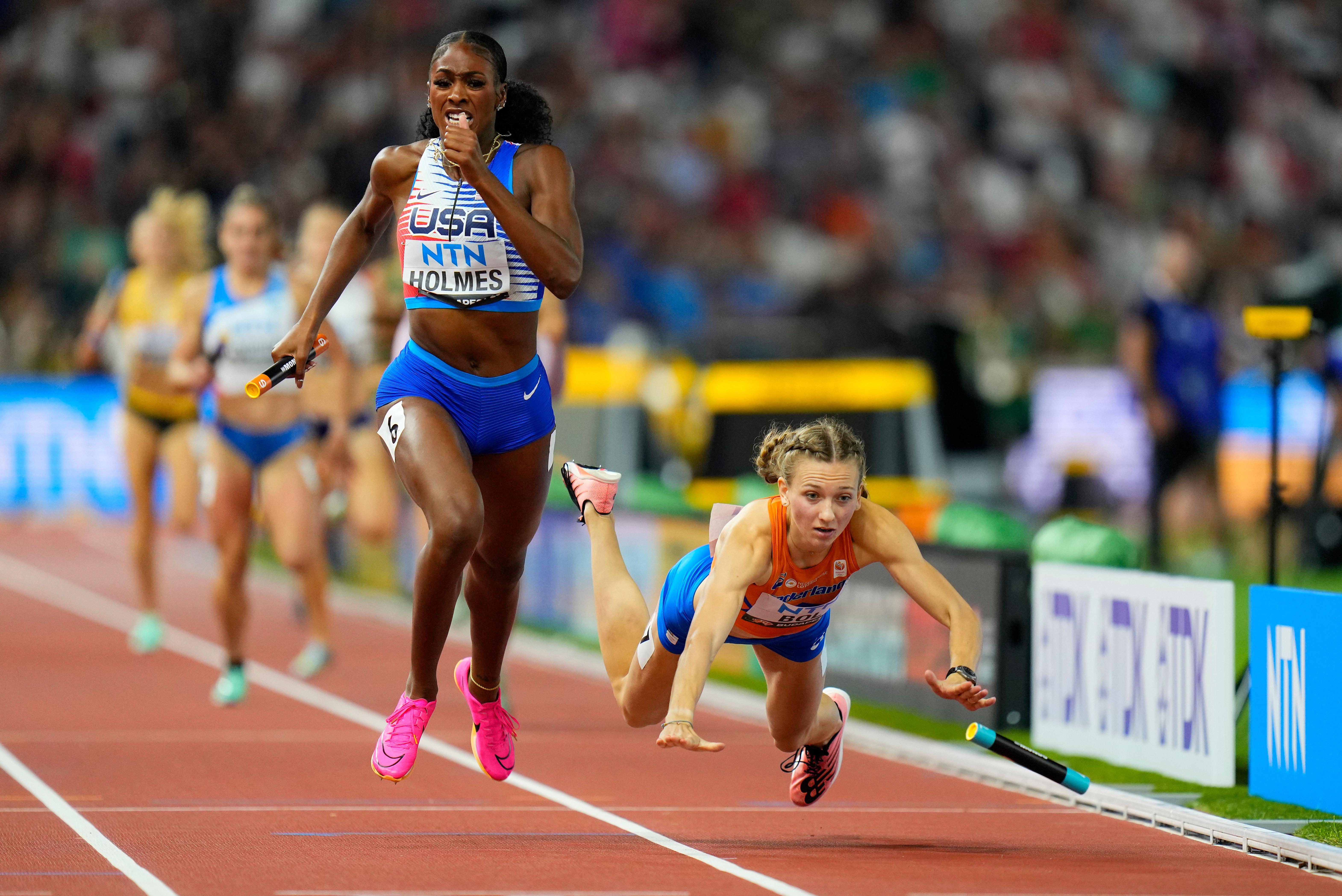 Runners Alexis Holmes of the United States and Femke Bol of the Netherlands
