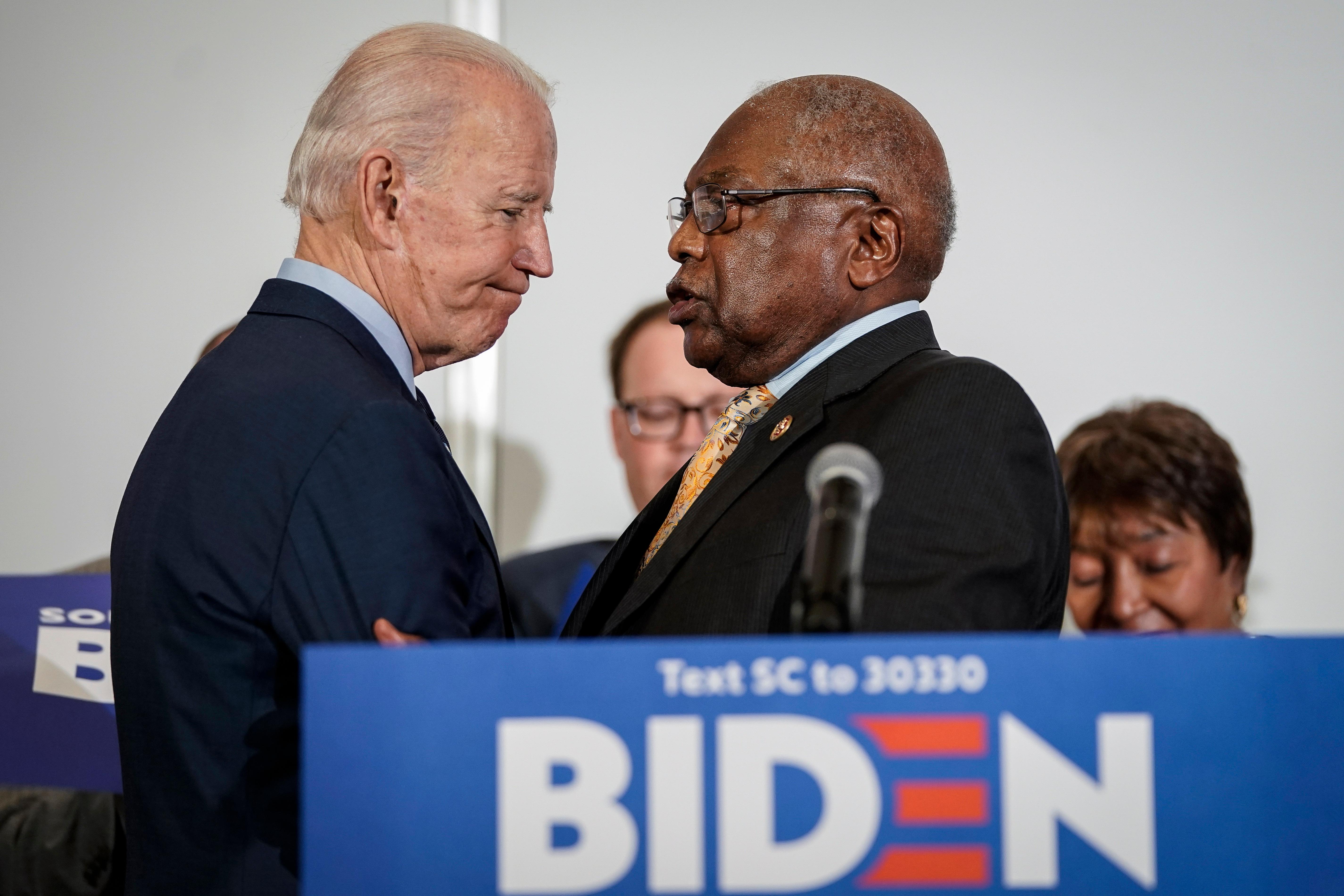 President Joe Biden shakes hands with Rep. James Clyburn, D-S.C.