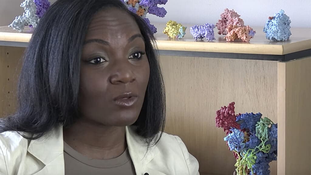Dr. Kizzmekia ‘Kizzy’ Corbett wearing a cream jacket and brown top