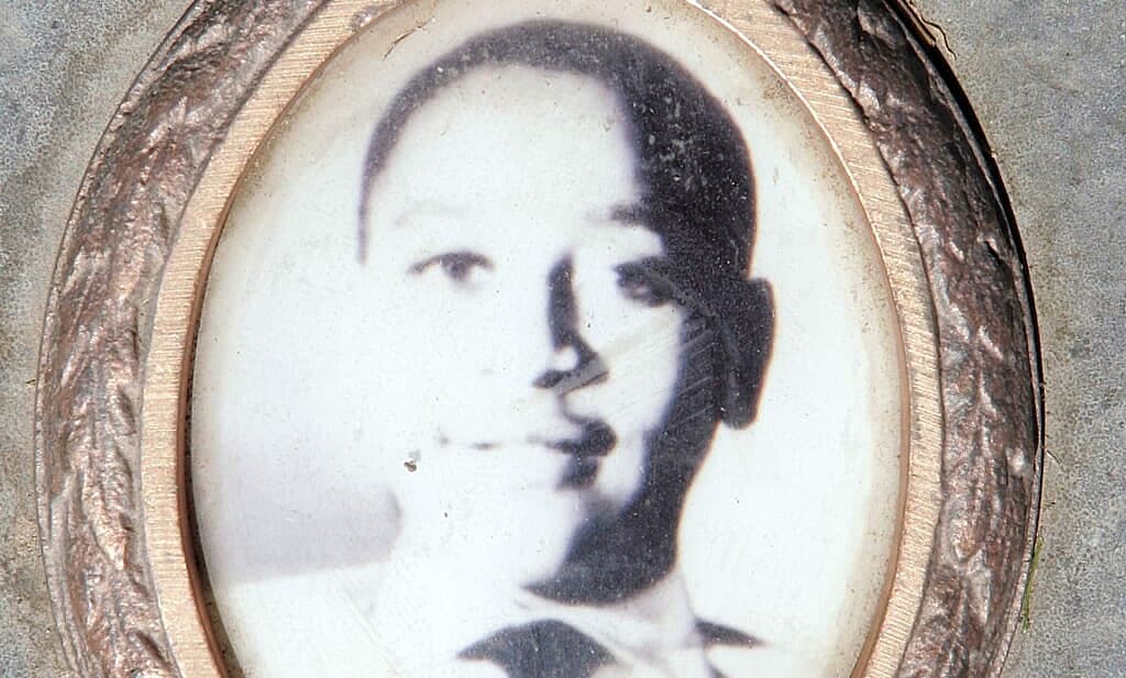 A photo of Emmett Till from the plaque on his gravesite