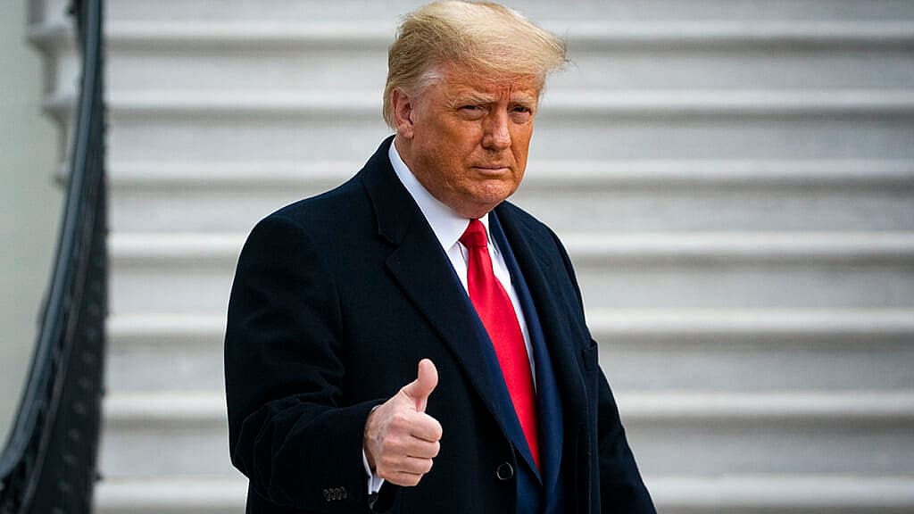 Former President Donald Trump gives a thumbs-up
