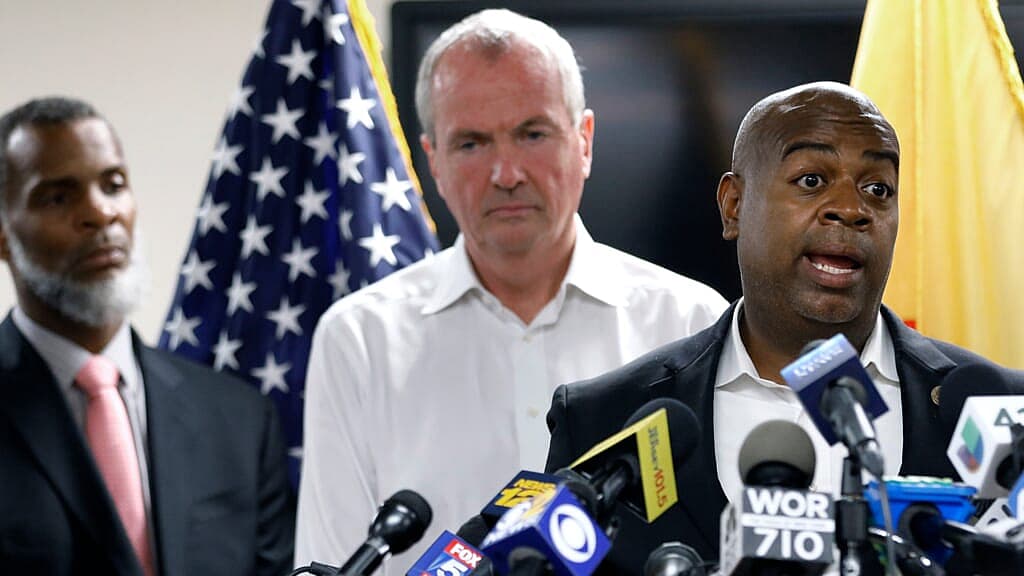 Kareem Addem, acting director of Water and Sewer Utilities, NJ Governor Phil Murphy and Newark Mayor Ras Baraka