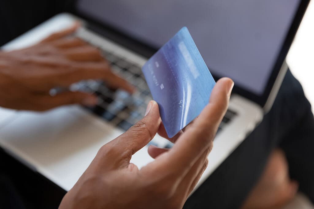 Black woman pays bill with credit card, theGrio.com