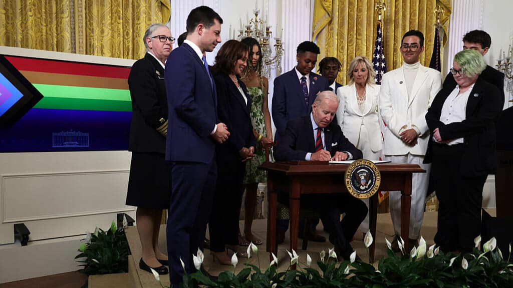 President Joe Biden by Transportation Secretary Pete Buttigieg, Vice President Kamala Harris and first lady Jill Biden