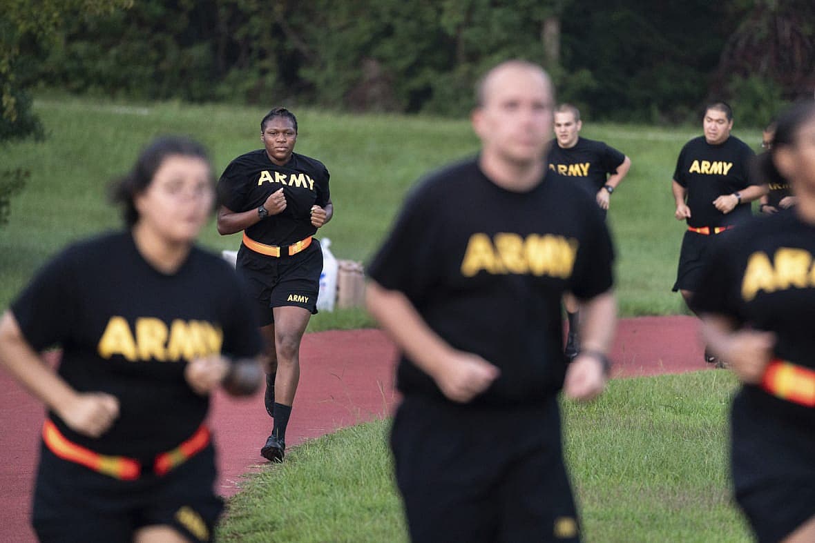 Students in the new Army prep course run around a track