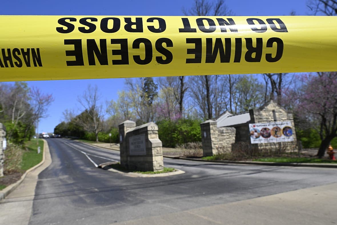 Police crime scene tape is seen at the entrance to Covenant School in Nashville, Tennessee