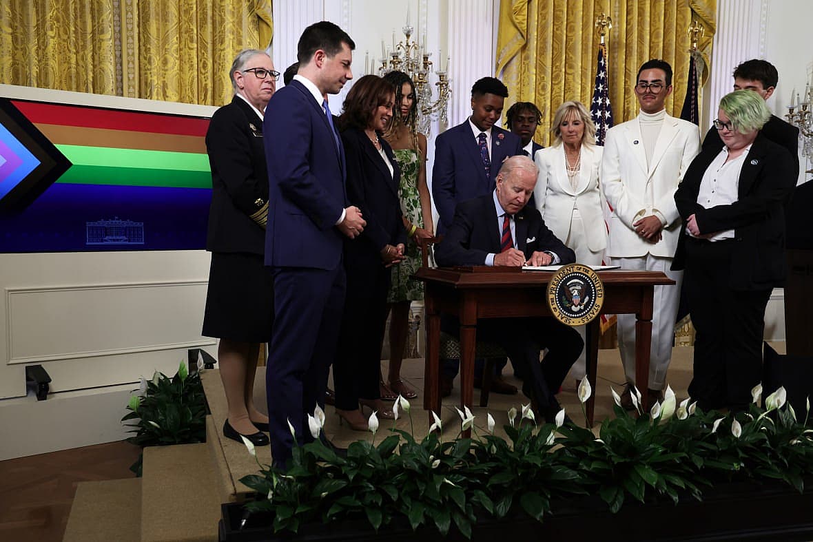 President Joe Biden, Transportation Secretary Pete Buttigieg, VP Kamala Harris, first lady Jill Biden and Javier Gomez