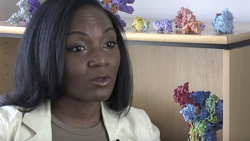 Dr. Kizzmekia ‘Kizzy’ Corbett wearing a cream jacket and brown top