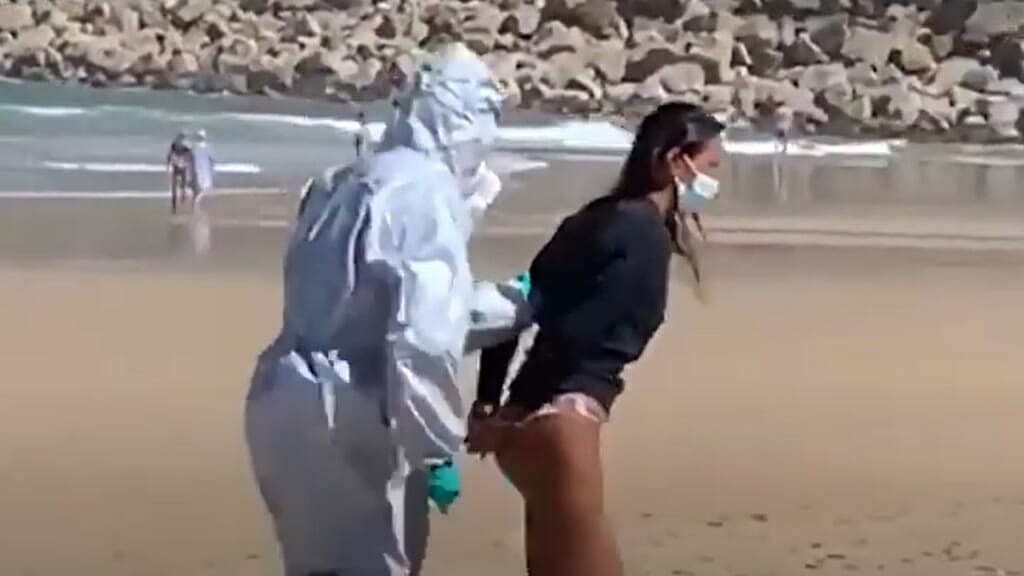Surfer Spain police thegrio.com
