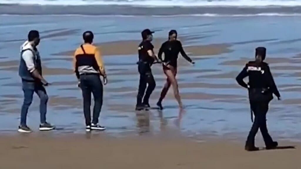 Surfer Spain police thegrio.com