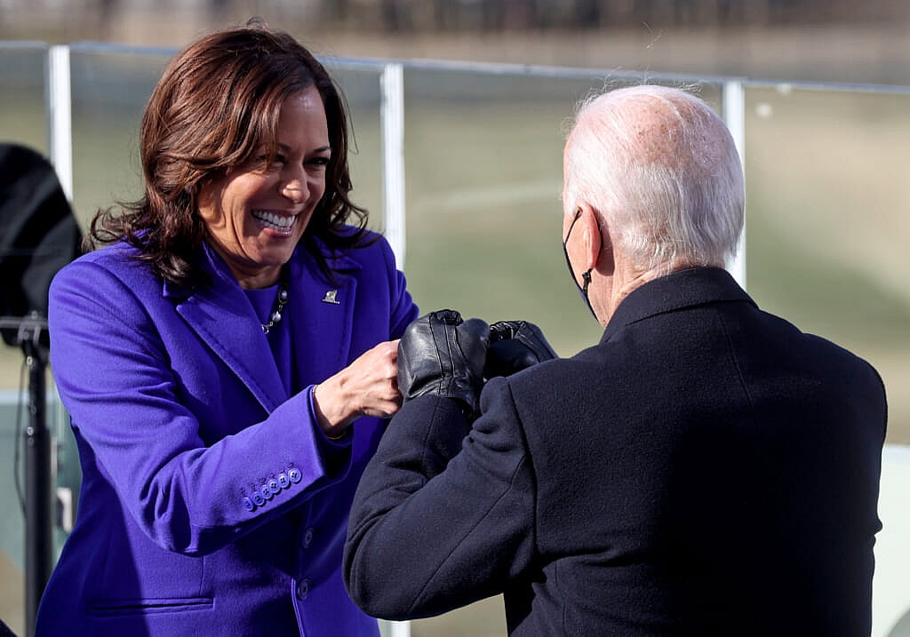 Vice President Kamala Harris bumps fists with President Joe Biden